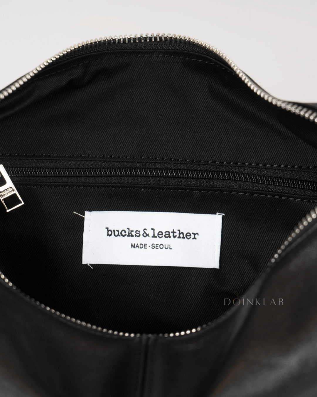 BUCKS AND LEATHER Curve Mini